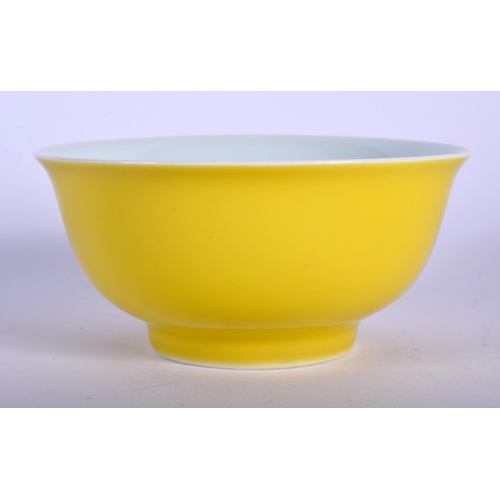 1113 - A CHINESE YELLOW GROUND PORCELAIN BOWL 20th Century, bearing Kangxi marks to base. 11 cm diameter.