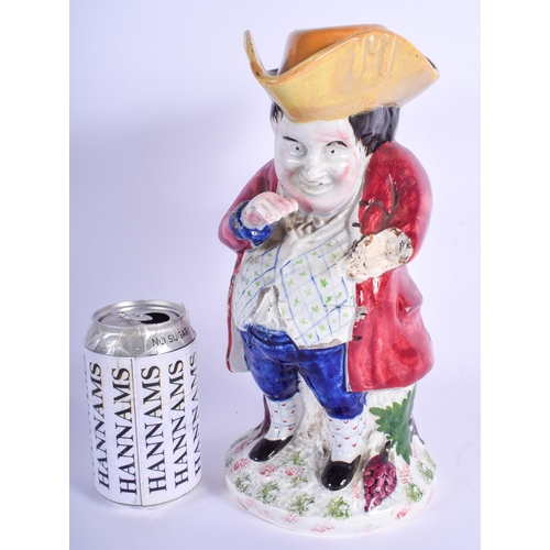 112 - AN EARLY 19TH CENTURY BRITISH TOBY JUG AND COVER probably Scottish, modelled taking snuff . 30 cm hi... 