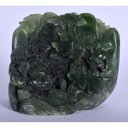 1121 - AN EARLY 20TH CENTURY CHINESE GREEN JADE MOUNTAIN GROUP Late Qing, formed with a scholar within a la... 