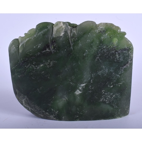 1121 - AN EARLY 20TH CENTURY CHINESE GREEN JADE MOUNTAIN GROUP Late Qing, formed with a scholar within a la... 