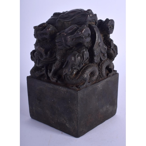 1129 - A LARGE CHINESE BRONZE DRAGON SEAL 20th Century. 15 cm x 8 cm.