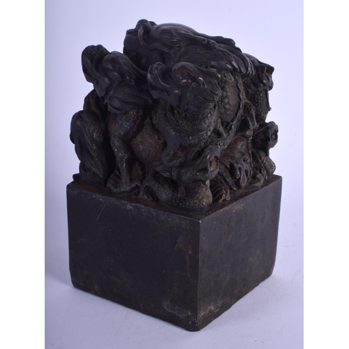 1129 - A LARGE CHINESE BRONZE DRAGON SEAL 20th Century. 15 cm x 8 cm.