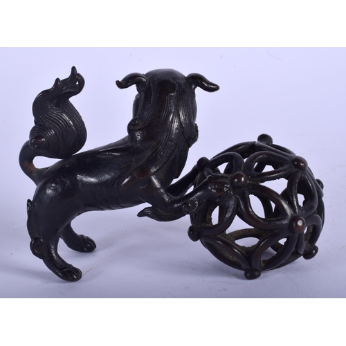 1132 - A 17TH/18TH CENTURY CHINESE BRONZE FIGURE OF A BUDDHISTIC LION Ming/Qing. 11 cm x 7 cm.