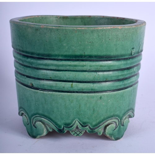 1133 - A CHINESE QING DYNASTY GREEN GLAZED POTTERY CENSER possibly earlier, decorated with a central bandin... 