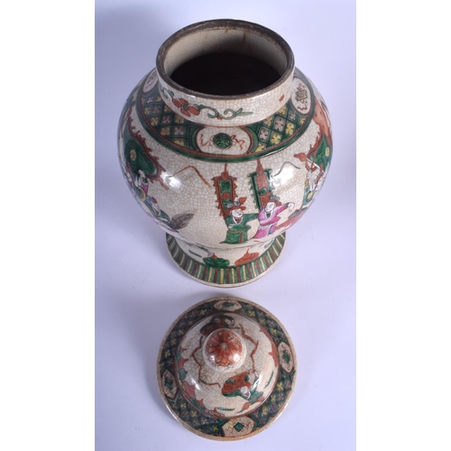 1134 - A LARGE 19TH CENTURY CHINESE FAMILLE VERTE VASE AND COVER of crackle glazed form. 45 cm x 21 cm.