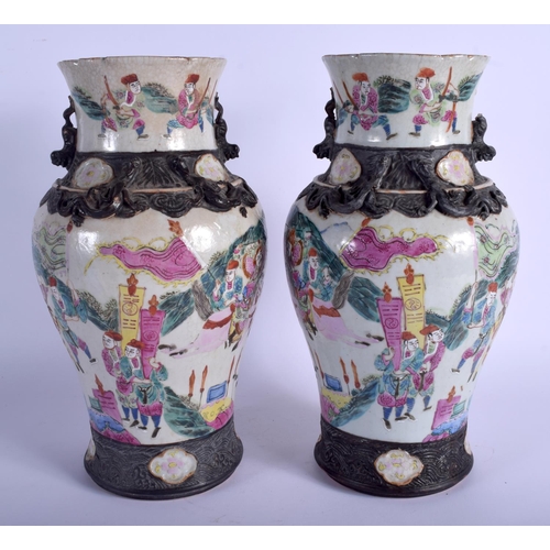 1136 - A LARGE PAIR OF 19TH CENTURY CHINESE CRACKLE GLAZED VASES Qing, painted with warriors within landsca... 