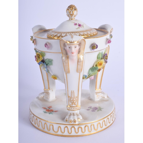 114 - A 19TH MEISSEN PORCELAIN INKWELL AND COVER painted with flowers, formed with Egyptian revival mounts... 