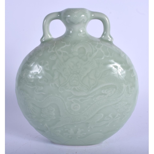 1142 - A CHINESE TWIN HANDLED CELADON MOON PILGRIM FLASK 20th Century, bearing Qianlong marks to base, deco... 