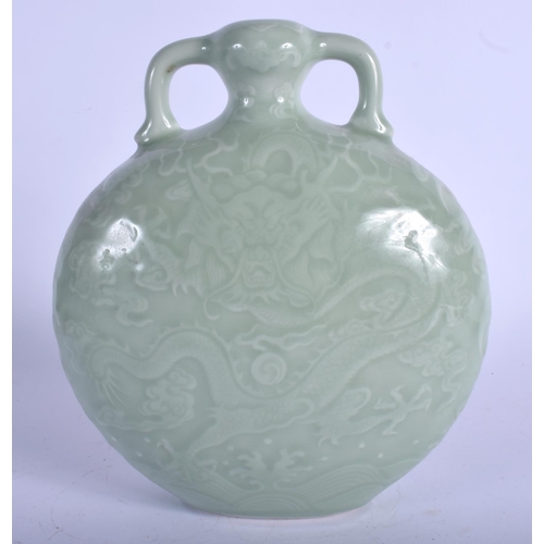 1142 - A CHINESE TWIN HANDLED CELADON MOON PILGRIM FLASK 20th Century, bearing Qianlong marks to base, deco... 