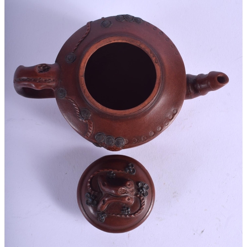 1144 - AN EARLY 20TH CENTURY CHINESE YIXING TEAPOT AND COVER overlaid with pine trees and vines. 15 cm wide... 