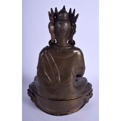 1147 - A 19TH CENTURY CHINESE TIBETAN ASIAN BRONZE FIGURE OF A BUDDHA Qing, modelled with clasped hands. 28... 