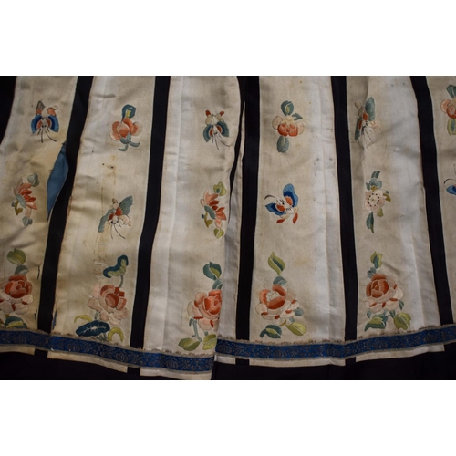 1159 - A LATE 19TH CENTURY CHINESE SILK EMBROIDERED SKIRT Late Qing, decorated with foliage and vines. 100 ... 