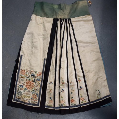 1159 - A LATE 19TH CENTURY CHINESE SILK EMBROIDERED SKIRT Late Qing, decorated with foliage and vines. 100 ... 