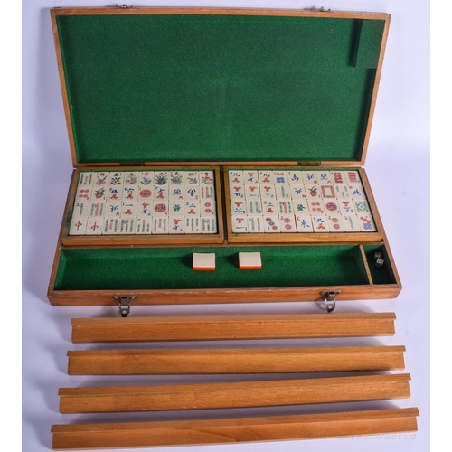 1173 - A VINTAGE CHINESE BOXED MAHJONG SET. Box 45 cm x 23 cm.