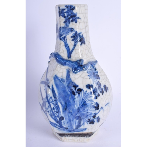 1201 - A 19TH CENTURY CHINESE BLUE AND WHITE PORCELAIN VASE painted with a figure within a landscape. 21 cm... 