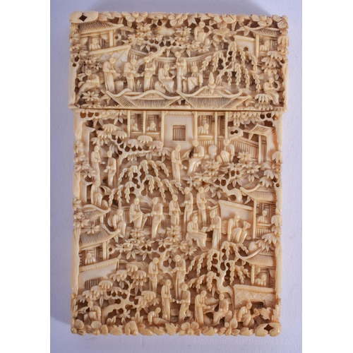 1202 - A 19TH CENTURY CHINESE CANTON IVORY CARD CASE AND COVER Qing, decorated with figures within landscap... 