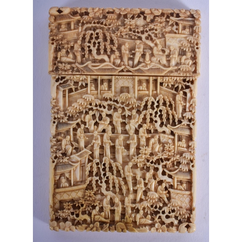 1202 - A 19TH CENTURY CHINESE CANTON IVORY CARD CASE AND COVER Qing, decorated with figures within landscap... 