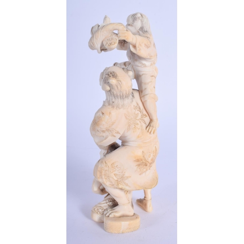 1212 - A 19TH CENTURY JAPANESE MEIJI PERIOD CARVED IVORY OKIMONO modelled as oni with two others. 14 cm hig... 