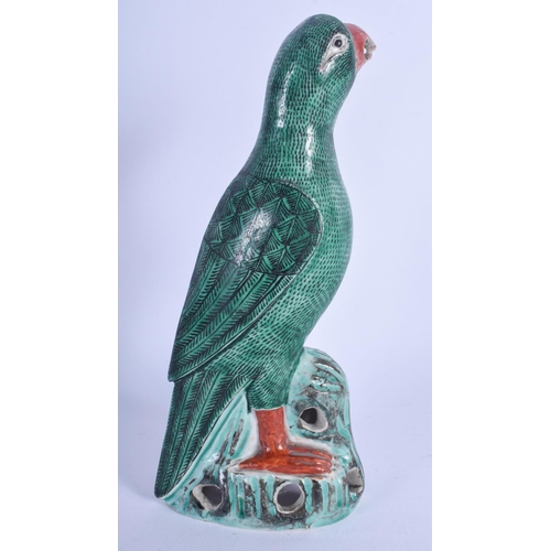 1213 - A 17TH/18TH CENTURY CHINESE FAMILLE VERTE FIGURE OF A PARROT Kangxi/Yongzheng, upon an openwork base... 