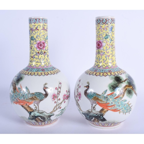 1214 - A PAIR OF CHINESE REPUBLICAN PERIOD FAMILLE ROSE VASES decorated with flowers and birds. 24 cm high.