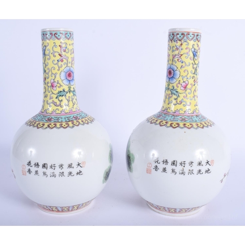 1214 - A PAIR OF CHINESE REPUBLICAN PERIOD FAMILLE ROSE VASES decorated with flowers and birds. 24 cm high.