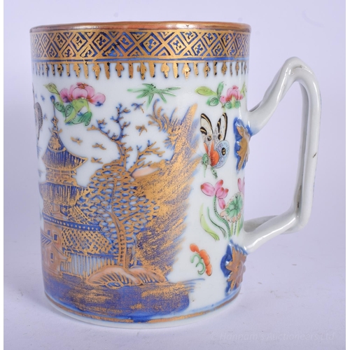 1217 - AN 18TH CENTURY CHINESE EXPORT BLUE AND WHITE MUG Qianlong, painted with landscapes. 11 cm high.