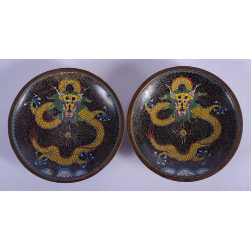 1231 - A PAIR OF EARLY 20TH CENTURY CHINESE CLOISONNÉ ENAMEL DISHES Late Qing. 10 cm diameter.