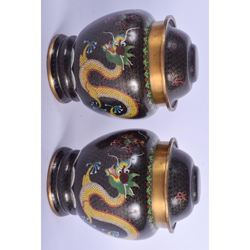 1232 - A PAIR OF EARLY 20TH CENTURY CHINESE CLOISONNÉ ENAMEL JARS AND COVERS Late Qing. 18 cm high.