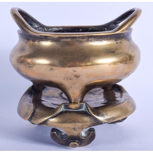 1251 - AN 18TH/19TH CENTURY CHINESE TWIN HANDLED BRONZE CENSER ON STAND Qing, bearing Xuande marks to base.... 