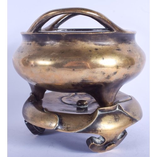 1251 - AN 18TH/19TH CENTURY CHINESE TWIN HANDLED BRONZE CENSER ON STAND Qing, bearing Xuande marks to base.... 