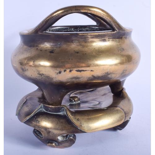 1251 - AN 18TH/19TH CENTURY CHINESE TWIN HANDLED BRONZE CENSER ON STAND Qing, bearing Xuande marks to base.... 