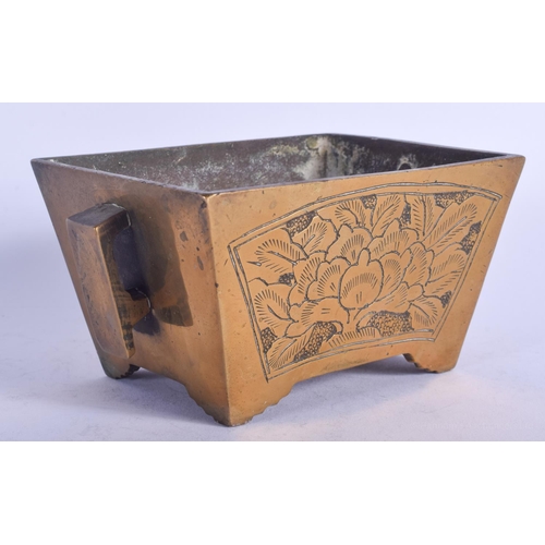 1260 - A 19TH CENTURY CHINESE TWIN HANDLED BRONZE CENSER bearing Xuande marks to base, decorated with flowe... 