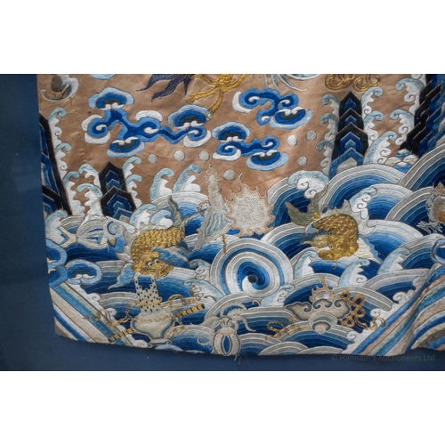 1262 - A VERY LARGE 19TH CENTURY FRAMED IMPERIAL CHINESE ROBE Qing, decorated with dragons amongst crashing... 