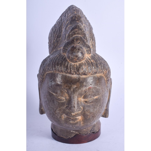 1274 - A RARE CHINESE TANG/SONG DYNASTY CARVED STONE HEAD OF A BUDDHIST DEITY elegantly modelled upon a fit... 