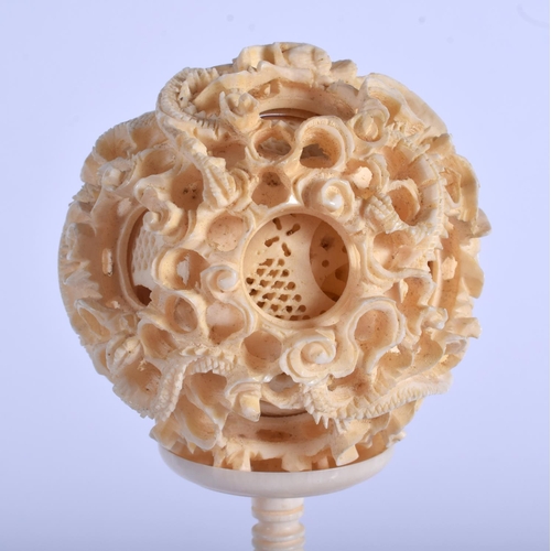 1293 - A LARGE 19TH CENTURY CHINESE CANTON CARVED IVORY PUZZLE BALL ON STAND Late Qing. 32 cm x 6 cm.