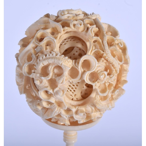 1293 - A LARGE 19TH CENTURY CHINESE CANTON CARVED IVORY PUZZLE BALL ON STAND Late Qing. 32 cm x 6 cm.