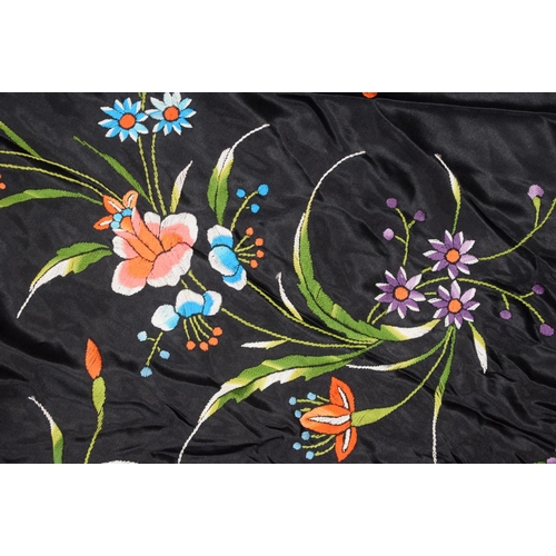 1314 - THREE LARGE EARLY 20TH CENTURY CHINESE SILKWORK SHAWLS decorated with butterflies and flowers. (3)