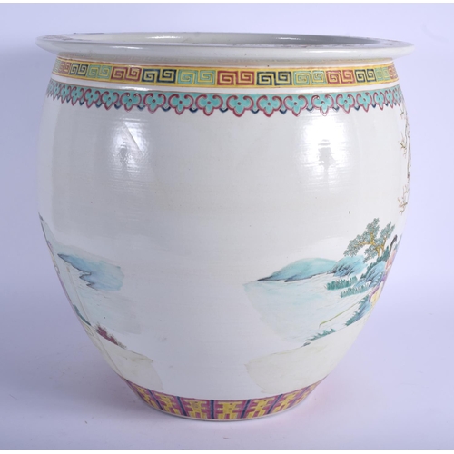 1347 - A 1950S CHINESE FAMILLE ROSE PORCELAIN JARDINIERE painted with females within landscapes. 41 cm x 31... 