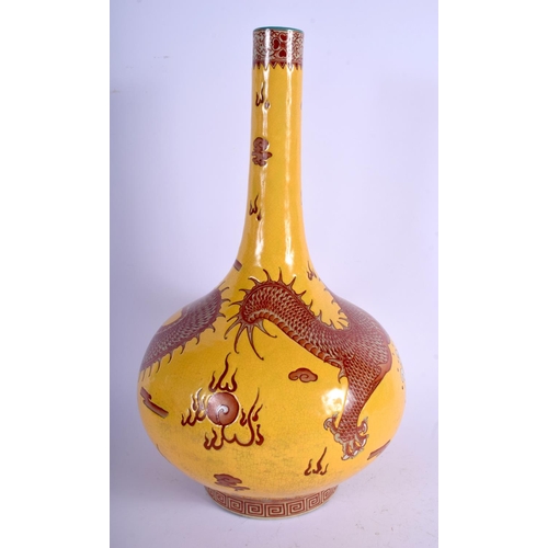 1352 - A LARGE CHINESE YELLOW GLAZED IRON RED PORCELAIN VASE 20th Century, together with a large charger. V... 