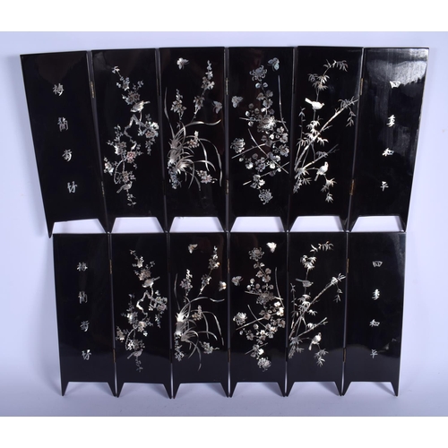 1354 - A PAIR OF 1960S ORIENTAL BLACK LACQUER AND MOTHER OF PEARL SCREENS decorated with fish and birds. 80... 