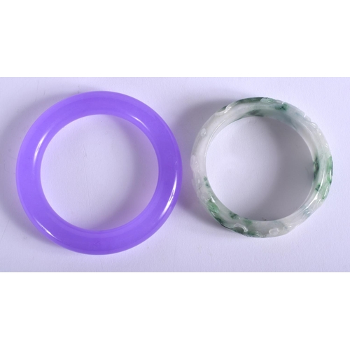 1356 - TWO CHINESE JADE BANGLES 20th Century. 9 cm diameter. (2)