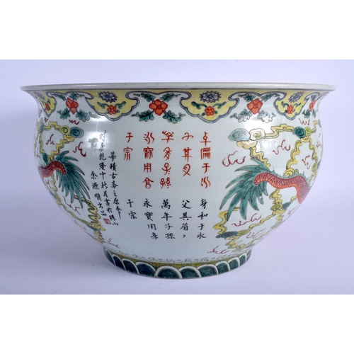 1376 - A LARGE EARLY 20TH CENTURY CHINESE WUCAI PORCELAIN JARDINIERE painted with five claw dragons amongst... 