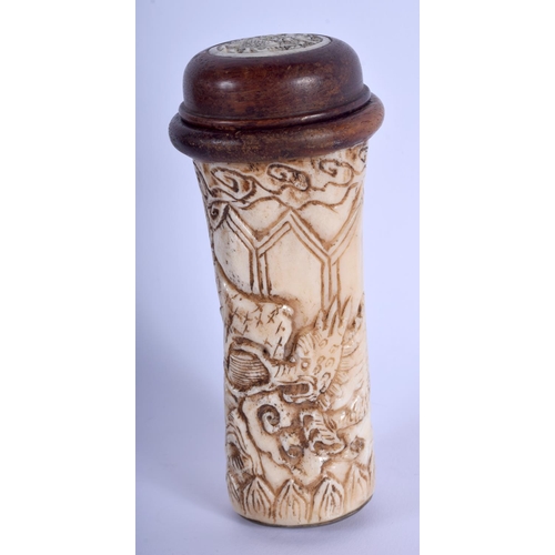 1386 - A 19TH CENTURY CHINESE CARVED BONE AND RHINOCEROS HORN CRICKET CAGE decorated with dragons. 14 cm x ... 