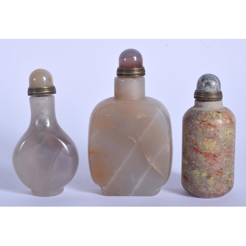 1400 - THREE CHINESE CARVED AGATE STONE SNUFF BOTTLES 20th Century. Largest 9 cm x 3.5 cm. (3)