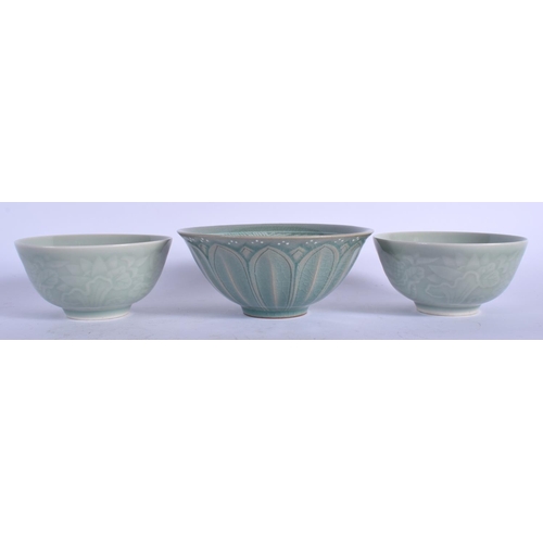 1414 - THREE CHINESE CELADON BOWLS 20th Century. Largest 14 cm wide. (3)