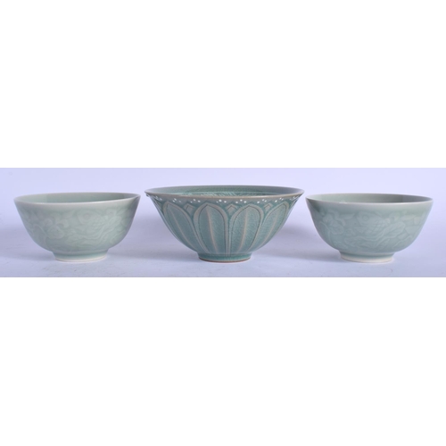 1414 - THREE CHINESE CELADON BOWLS 20th Century. Largest 14 cm wide. (3)