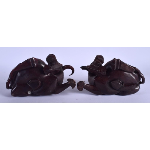 1421 - A PAIR OF 19TH CENTURY CHINESE CARVED BUFFALO HARDWOOD FIGURES Qing. 23 cm x 22 cm.