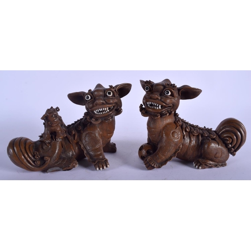 1423 - A PAIR OF EARLY 20TH CENTURY CHINESE TERRACOTTA YIXING BUDDHISTIC DOGS Late Qing. 19 cm x 14 cm.