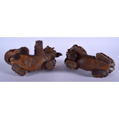 1423 - A PAIR OF EARLY 20TH CENTURY CHINESE TERRACOTTA YIXING BUDDHISTIC DOGS Late Qing. 19 cm x 14 cm.