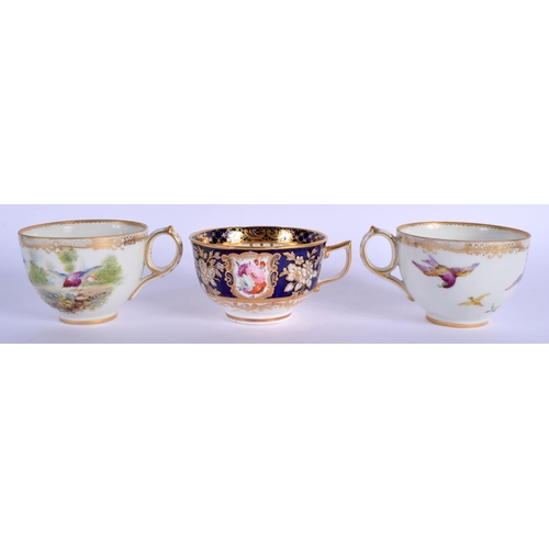 144 - 19th c. Coalport moulded teacup and saucer painted with flowers on a blue ground and two teacups and... 